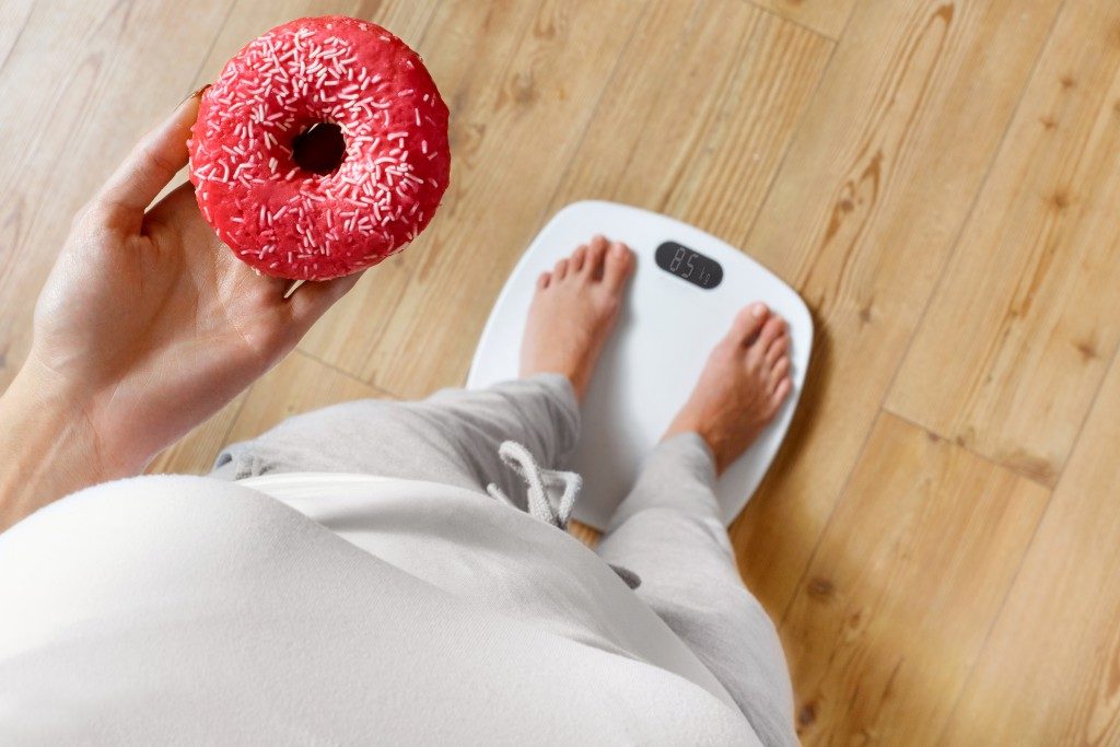 On weighing scale holding donut