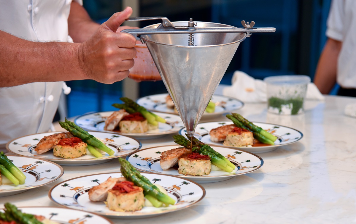 chef preparing food for catering