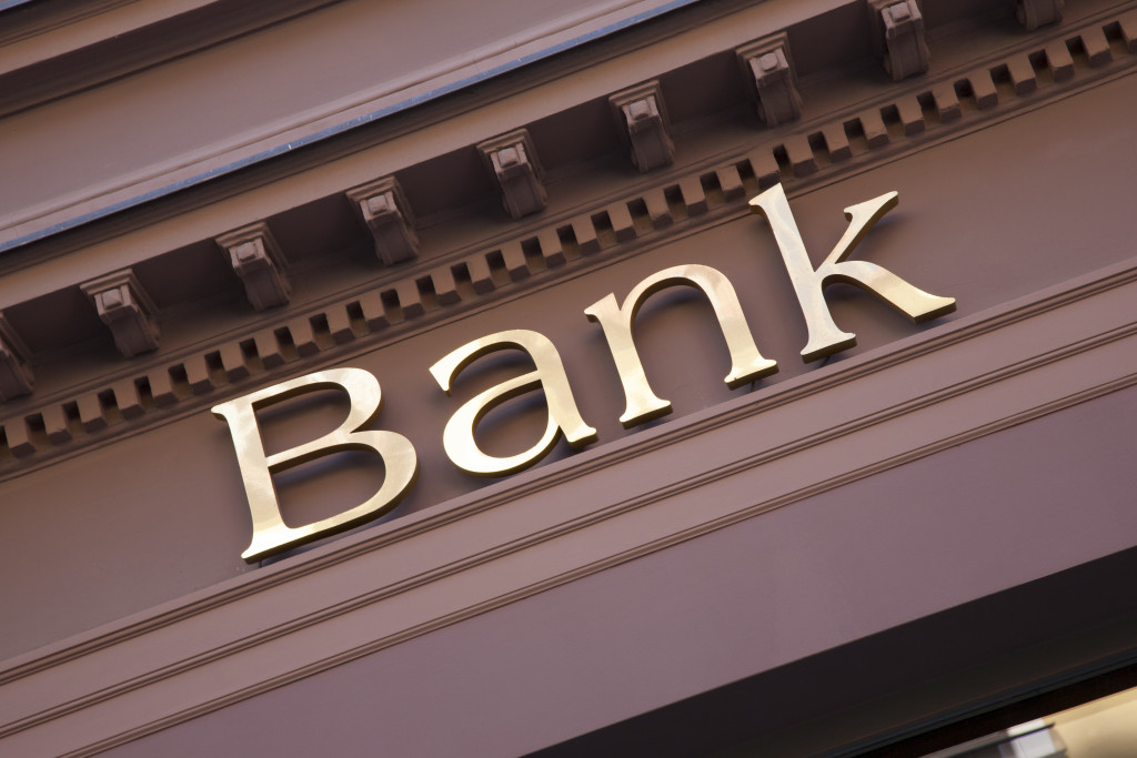 Bank sign on the facade of a branch.