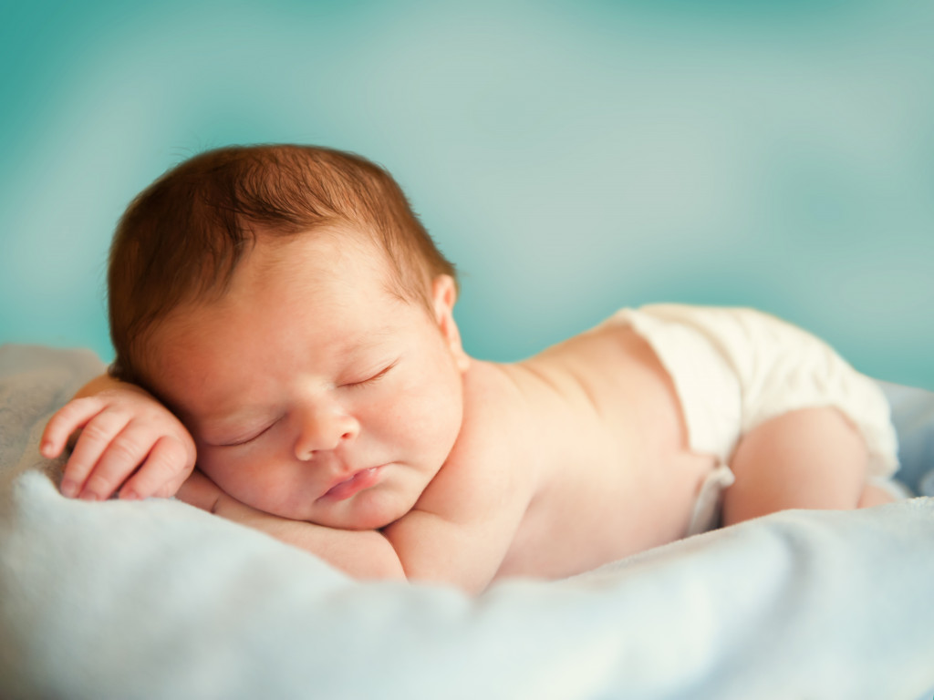 A newborn sleeping soundly