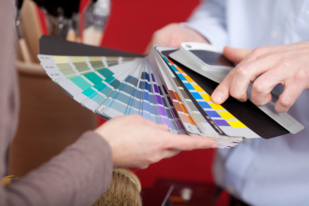 woman choosing color from palette