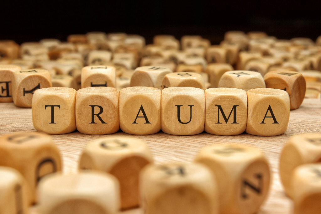Trauma spelled on wood block