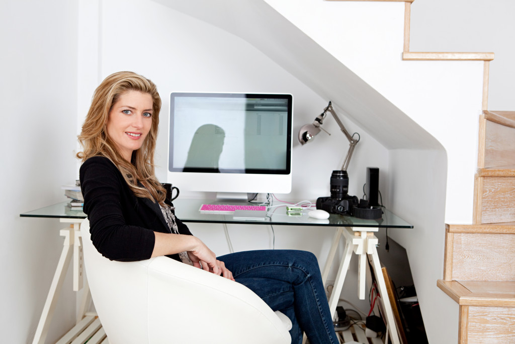 female photographer in her home office