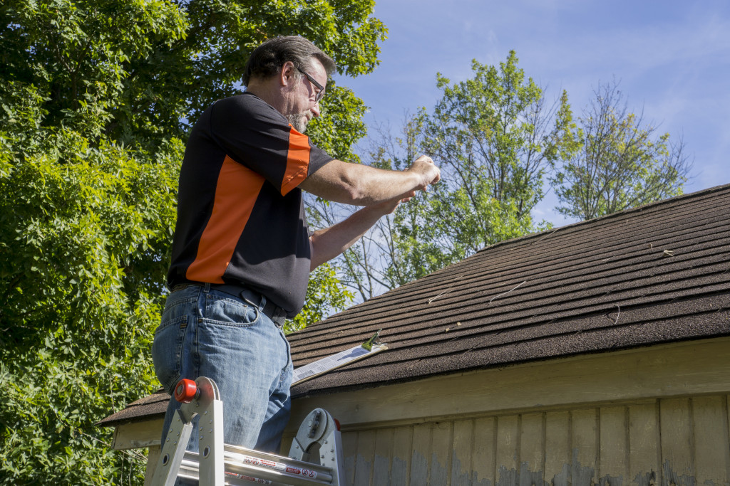 a roofing contractor in action