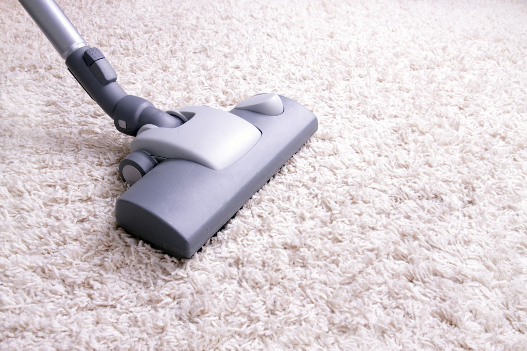 Closeup of a vacuum on a carpet
