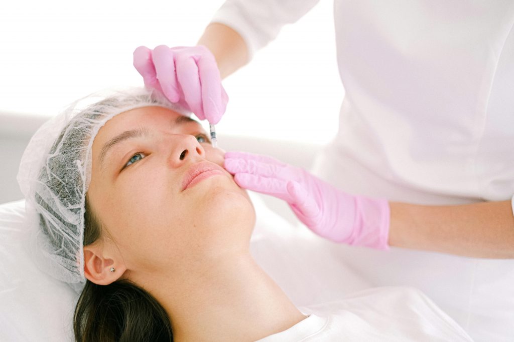 patient receiving Botox while lying down